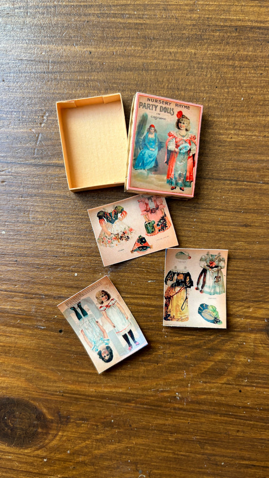 party dolls in costume paper